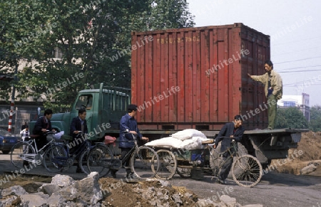 a container transport in the city of xian in china in east asia. 