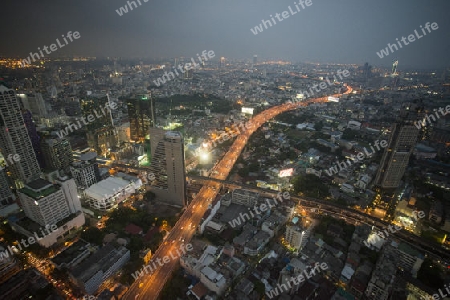 The Skyline view from the Sky Bar at the Riverside Aerea in the city of Bangkok in Thailand in Southeastasia.