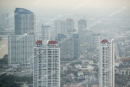 The Skyline view from the Sky Bar at the Riverside Aerea in the city of Bangkok in Thailand in Southeastasia.