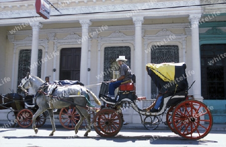 a horse cart Taxi transport in the old town of cardenas in the provine of Matanzas on Cuba in the caribbean sea.