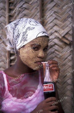 a women in the city of Moutsamudu on the Island of Anjouan on the Comoros Ilands in the Indian Ocean in Africa.   