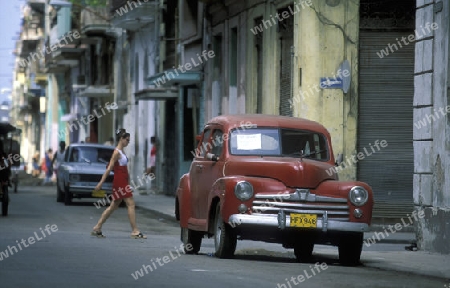 old cars in the old townl of the city of Havana on Cuba in the caribbean sea.