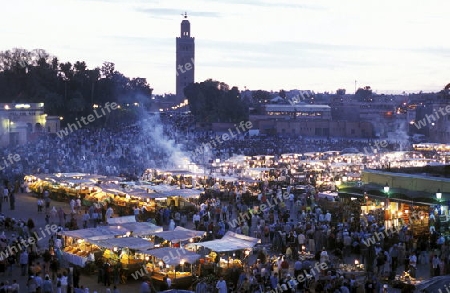 The Streetfood and Nightlife at the Djemma del Fna Square in the old town of Marrakesh in Morocco in North Africa.
