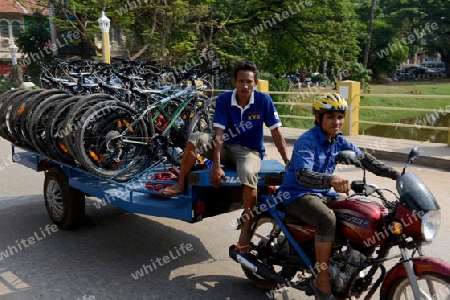 A transport on the Road of the old City of Siem Riep neat the Ankro Wat Temples in the west of Cambodia.