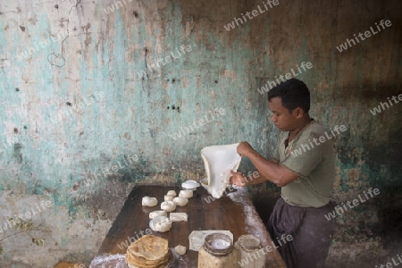 a Restaurant near the Town of Myingyan southwest of Mandalay in Myanmar in Southeastasia.