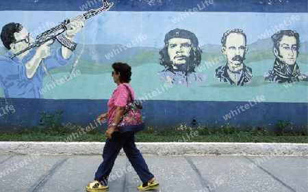 a women in the city of Holguin on Cuba in the caribbean sea.