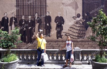 people in the old town of the city Havana on Cuba in the caribbean sea.