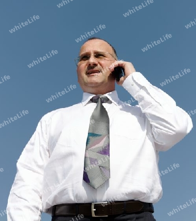 a businessman calling a company