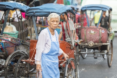 Bicycle Ricksha Taxis at the morning Market in Nothaburi in the north of city of Bangkok in Thailand in Southeastasia.