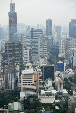 The Skyline view from the Sky Bar at the Riverside Aerea in the city of Bangkok in Thailand in Southeastasia.