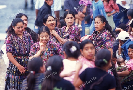 people in traditional clotes at the Market in the Village of  Chichi or Chichicastenango in Guatemala in central America.   