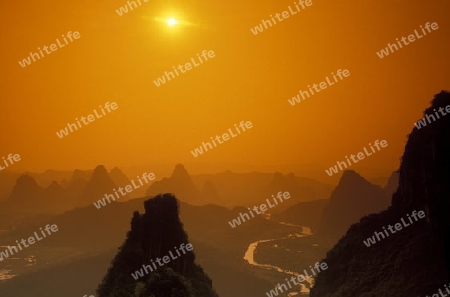 the landscape at the Li River near Yangshou near the city of  Guilin in the Province of Guangxi in china in east asia. 