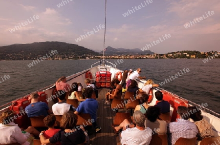 The Tourist Boat near the old town of Pallanza near to Verbania on the Lago maggiore in the Lombardia  in north Italy. 