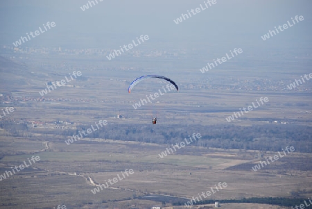 Man with a hang glider