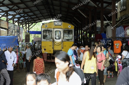 the Maeklong Railway Markt at the Maeklong railway station  near the city of Bangkok in Thailand in Suedostasien.