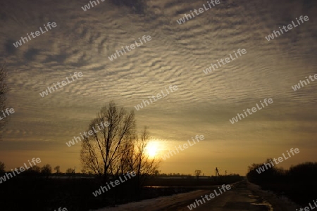 Wolkenwellen beimSonnenuntergang