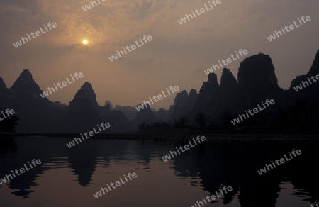 the landscape at the Li River near Yangshou near the city of  Guilin in the Province of Guangxi in china in east asia. 