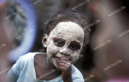 a women in the city of Moutsamudu on the Island of Anjouan on the Comoros Ilands in the Indian Ocean in Africa.   