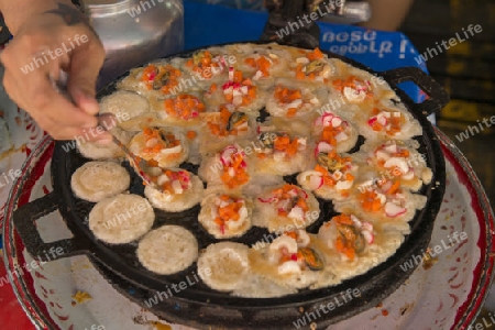 Thai Streetfood in a restaurant at the Chatuchak Weekend Market  in the city of Bangkok in Thailand in Southeastasia.