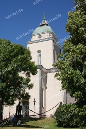 Kirche und Leuchtturm in einem auf Suomenlinna / Helsinki