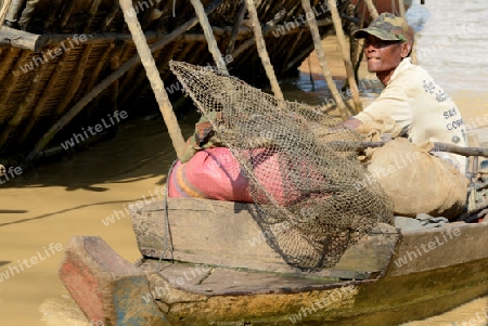 The People at wort in the Lake Village Kompong Pluk at the Lake Tonle Sap near the City of Siem Riep in the west of Cambodia.