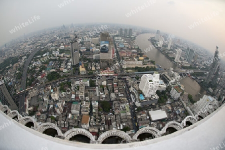 The Skyline view from the Sky Bar at the Riverside Aerea in the city of Bangkok in Thailand in Southeastasia.