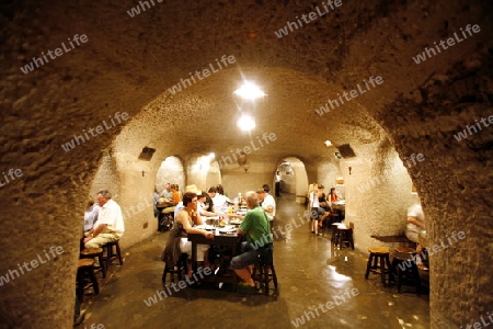 a Restaurant in a cave in the Barranco de Guayadeque in the Aguimes valley on the Canary Island of Spain in the Atlantic ocean.