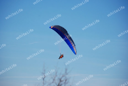 Man with a hang glider