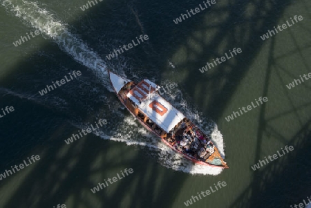 a boat on the Douro River in Ribeira in the city centre of Porto in Porugal in Europe.