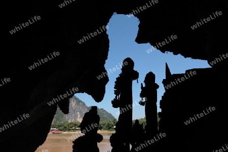 Die Pak Ou Hoehlen bei Luang Prabang in Zentrallaos von Laos in Suedostasien. 