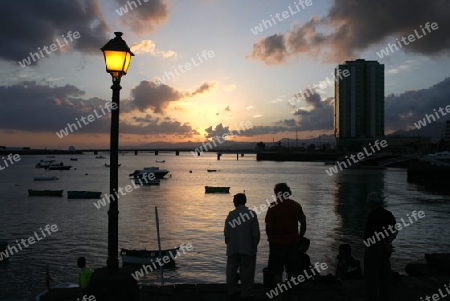 The promenade of the old town of the City of Arrecife on the Island of Lanzarote on the Canary Islands of Spain in the Atlantic Ocean. on the Island of Lanzarote on the Canary Islands of Spain in the Atlantic Ocean.
