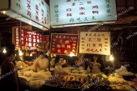 people on the Market streets of Chongqing in the province of Sichuan in china in east asia. 