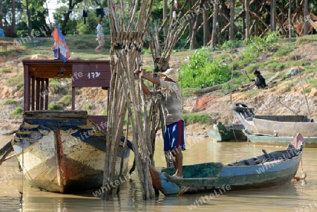 The People at wort in the Lake Village Kompong Pluk at the Lake Tonle Sap near the City of Siem Riep in the west of Cambodia.