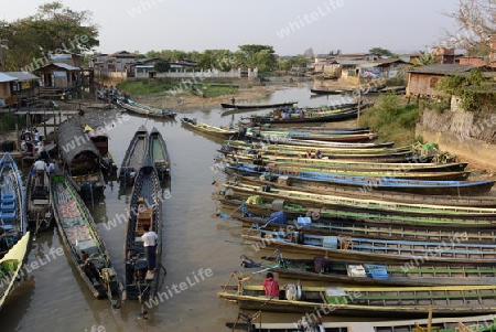 the Boat landing Pier at the Nan Chaung Main Canal in the city of Nyaungshwe at the Inle Lake in the Shan State in the east of Myanmar in Southeastasia.