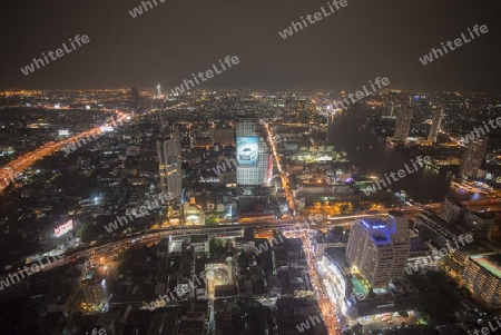 The Skyline view from the Sky Bar at the Riverside Aerea in the city of Bangkok in Thailand in Southeastasia.