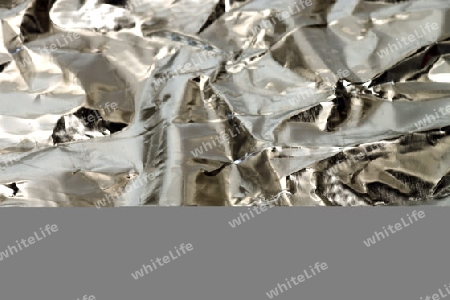 Zernkitterte Aluminiumfolie als Hintergrund