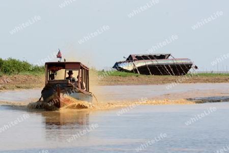 The People at wort in the Lake Village Kompong Pluk at the Lake Tonle Sap near the City of Siem Riep in the west of Cambodia.