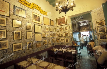 the Bar La Bodeguita del medio in the city of Havana on Cuba in the caribbean sea.