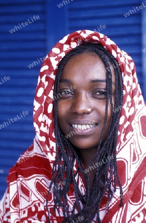 a women in the city of Moutsamudu on the Island of Anjouan on the Comoros Ilands in the Indian Ocean in Africa.   