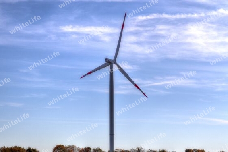 Panoramic view on alternative energy wind mills in a windpark