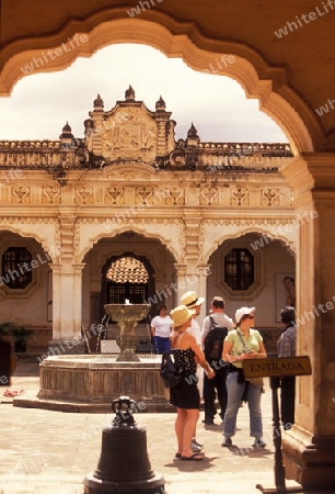 the old ruin of a church in the old town in the city of Antigua in Guatemala in central America.   