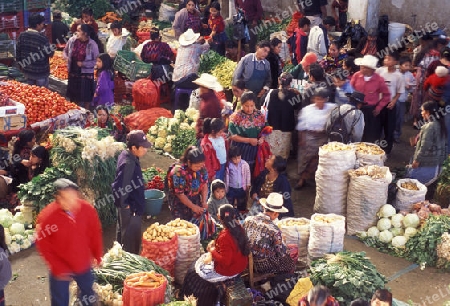 people in traditional clotes at the Market in the Village of  Chichi or Chichicastenango in Guatemala in central America.   