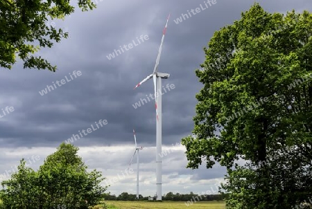 Panoramic view on alternative energy wind mills in a windpark