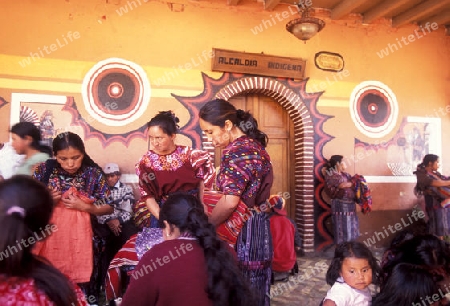 people in traditional clotes at the Market in the Village of  Chichi or Chichicastenango in Guatemala in central America.   