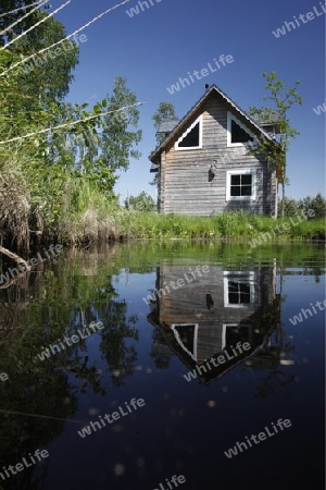 a House on a smal lake near the city of Vilnius and the Baltic State of Lithuania,  