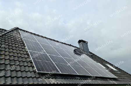 View at new solar panels on the roof of a residential house