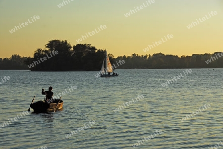 Angler und Segelboot