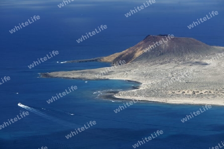 The  Isla Graciosa from the Mirador del Rio viewpoint on the Island of Lanzarote on the Canary Islands of Spain in the Atlantic Ocean. on the Island of Lanzarote on the Canary Islands of Spain in the Atlantic Ocean.
