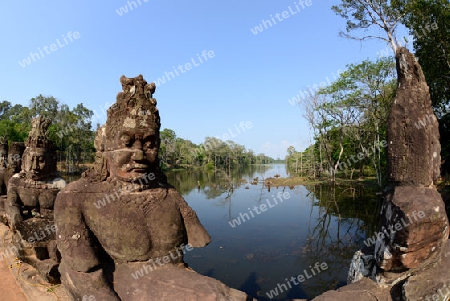 The Bridge at the Angkor Tom Gate in the Temple City of Angkor near the City of Siem Riep in the west of Cambodia.