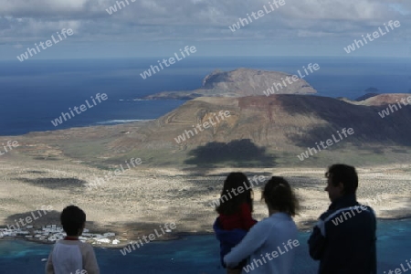 The  Isla Graciosa from the Mirador del Rio viewpoint on the Island of Lanzarote on the Canary Islands of Spain in the Atlantic Ocean. on the Island of Lanzarote on the Canary Islands of Spain in the Atlantic Ocean.
